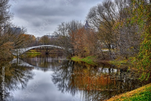 Autumn park on the river with a bridge © Igor Ullman