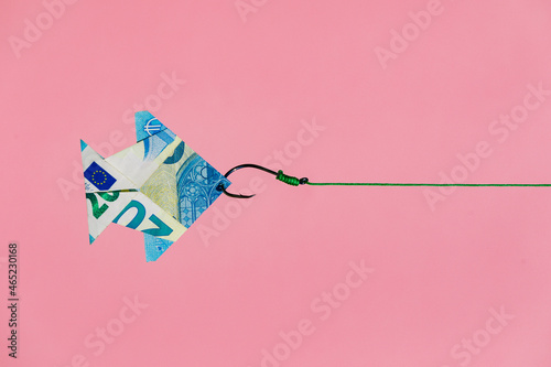 Origami money fish on hook