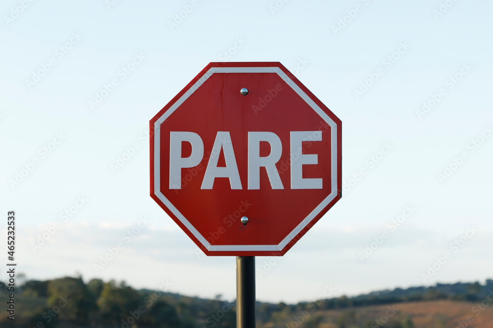 mandatory stop sign, in Portuguese PARE