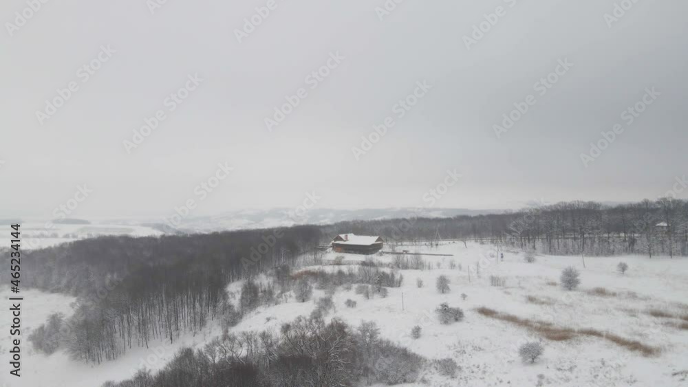 Aerial view of the snow-covered mountains. Winter forest. Pine trees. Winter wonderland. Mountains drone bird-eye view footage. Winter mountain view from above. Travel. Snow peaks. Ski resort Aerial view of the snow-covered mountains. Winter forest. Pine trees. Winter wonderland. Mountains drone bird-eye view footage. Winter mountain view from above. Travel. Snow peaks. Ski resort