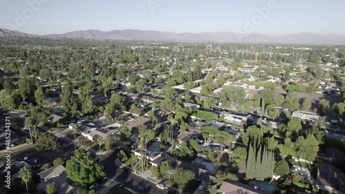 Residential neighborhood of houses, aerial view on hazy day in San Fernando Valley photo