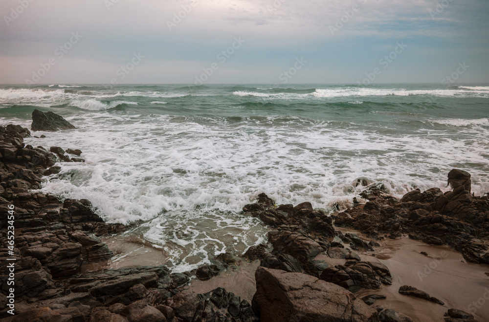 Landscape of rock on beach on a windy day Landscape of rock on beach on a windy day