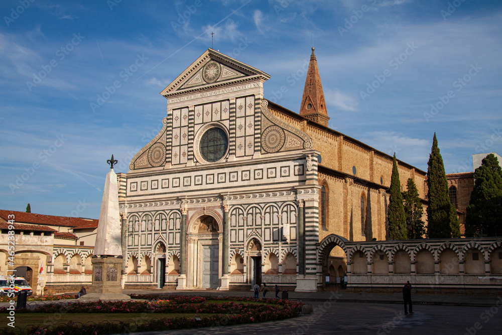 Medieval Basilica church of Santa Maria Novella in Florence, Tuscany, Italy with blue sky.