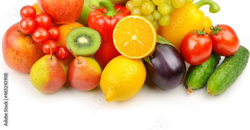 Vegetables and fruits isolated on a white . Place for your text. Wide photo.