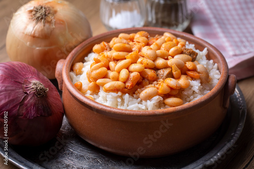 Traditional Turkish cuisine. Kuru Fasulye . Haricot Beans, rice and beans (Turkish name; pilav ustu kuru fasulye) photo