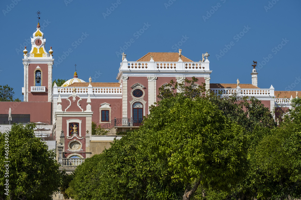 Estoi Palace, Romantic style architecture with its fine pink rococo façade in Estoi, Faro district, Algarve , portugal