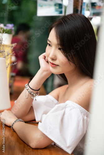 Portrait of young Asian beautiful cute girl in cafe  lifestyle concept