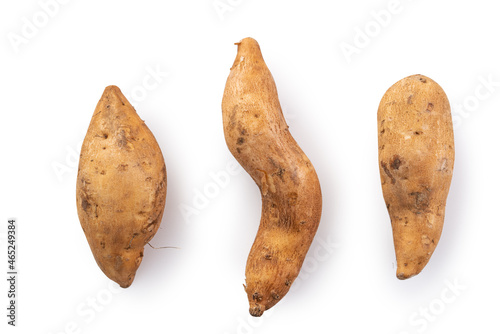 Raw sweet potato yam isolated on white table background.