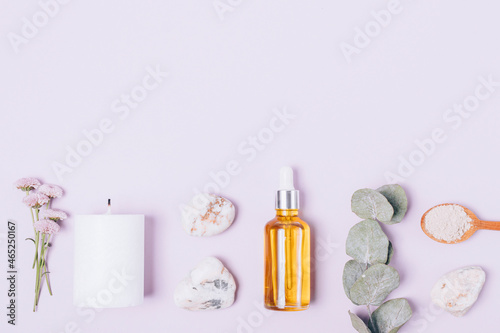 Cosmetic oil and natural homemade skin care products with lavender flowers photo
