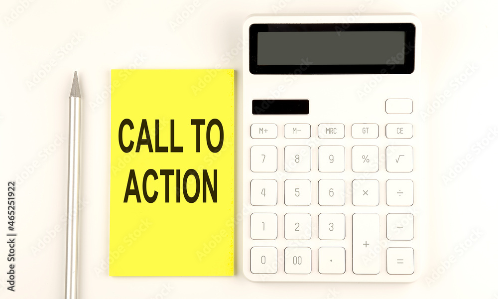 text CALL TO ACTION on the yellow sticker, next to pen and calculator text CALL TO ACTION on the yellow sticker, next to pen and calculator