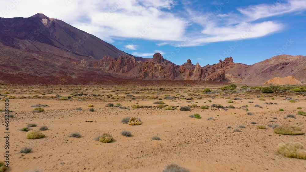 Aerial view of the Teide National Park, flight over a desert rocky surface, view of the mountains. Tenerife, Canary Islands Aerial view of the Teide National Park, flight over a desert rocky surface, view of the mountains. Tenerife, Canary Islands