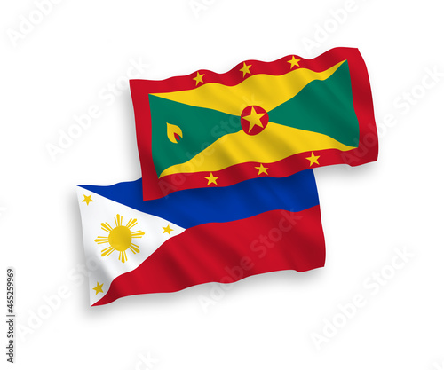 National vector fabric wave flags of Grenada and Philippines isolated on white background. 1 to 2 proportion.