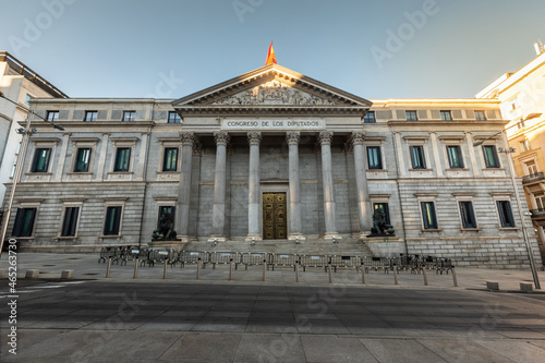 Spanish parliament (Congreso de los diputados) famous facade with two lions sculptures at each side; Madrid, Spain.