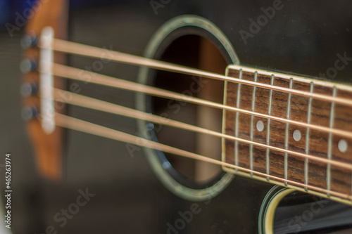 Acoustic bass guitar isolated on the white background