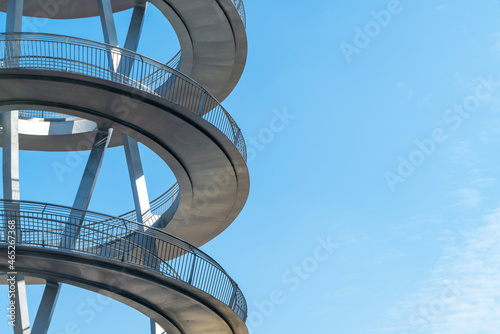 Geometric building structure of metal rotating stairs