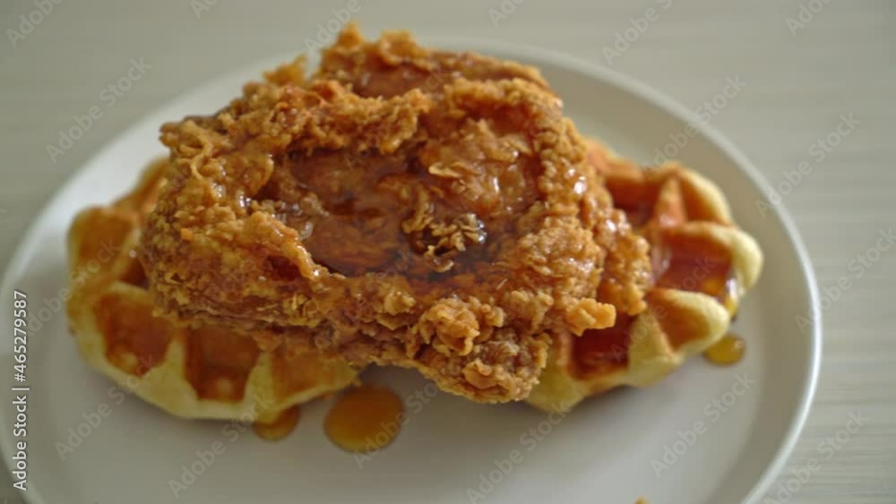 homemade fried chicken waffle with honey or maple syrup homemade fried chicken waffle with honey or maple syrup