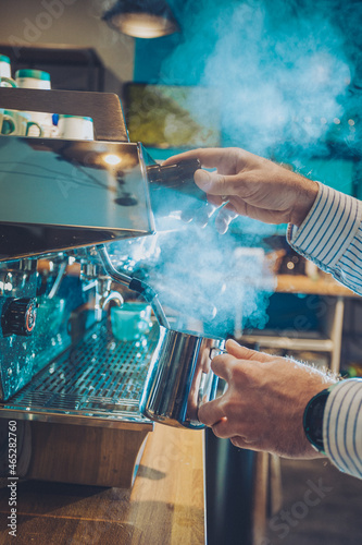 Steaming espresso coffee macine brewing coffee