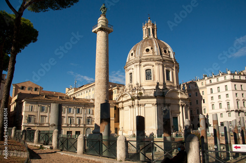 View on column of Traijan, church Santa Maria de Loreto,  Trajan Forum and pine trees in Rome photo