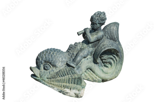 A fragment of a fountain. The boy rides a fish