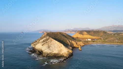 Cocedores beach and Carolina sunrise between cinematic cliffs photo