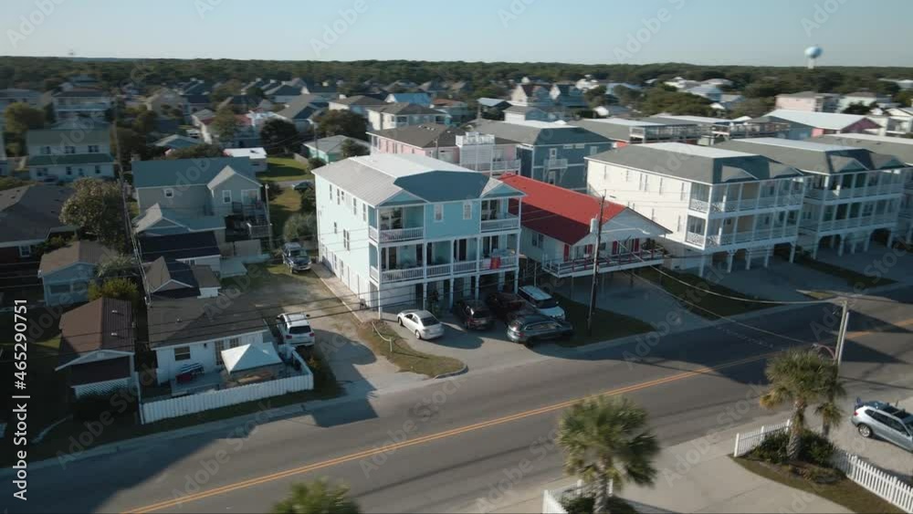Orbiting aerial around apartment property Kure Beach Northern California
