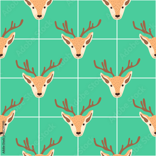 Christmas pattern with heads of reindeers on a green background. Vector illustration 