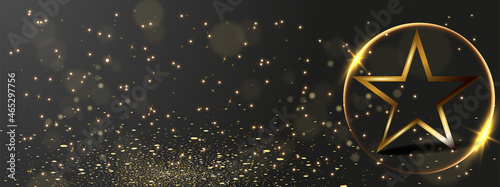 Golden vector star isolated on dark shining horizontal background.