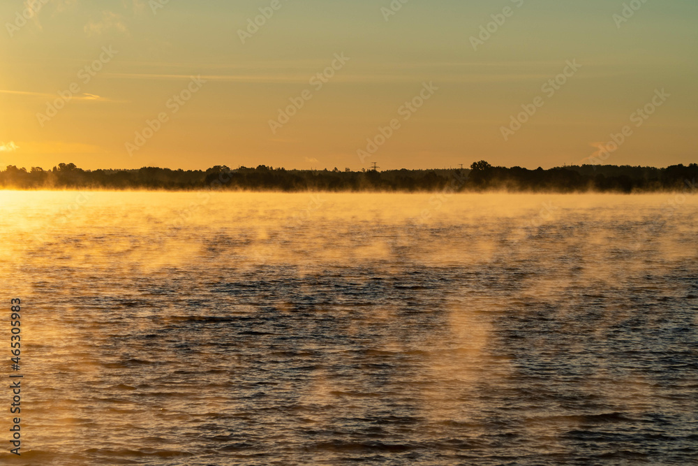 Obraz premium sunrise over the river