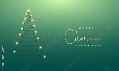 Christmas tree formed garland lights on green wall background. Xmas greeting card. Glowing lights isolated on backdrop. New Year design template.