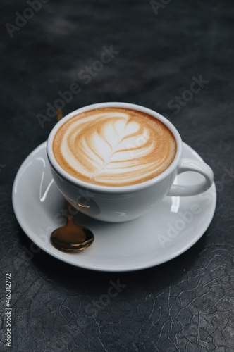 Top view White cup of Cappuccino Latte coffee isolated on black background with clipping path.