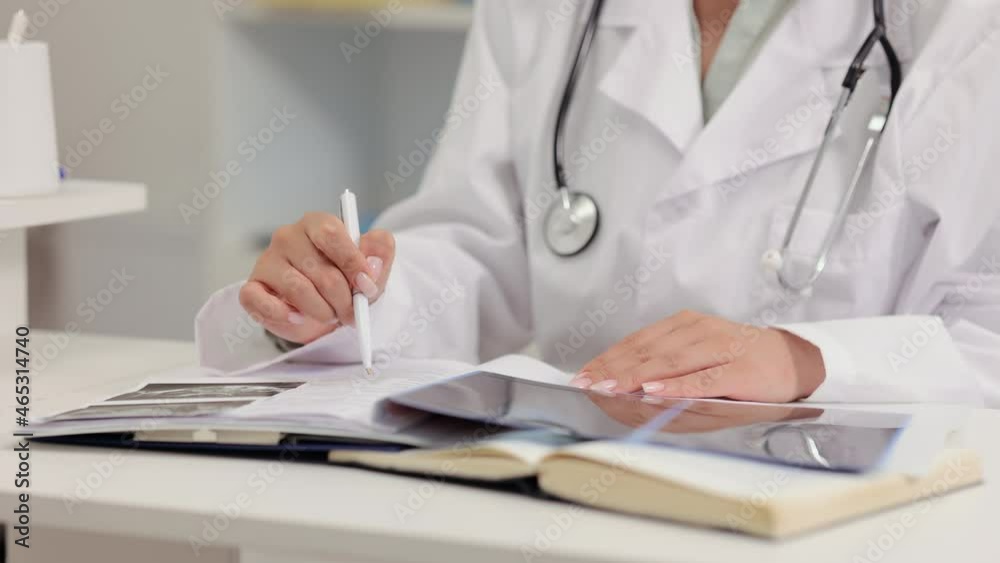 Doctor provides medical service of patients. Family therapist in uniform works spbi with client clinical records and x-ray pictures at table in hospital closeup 4k video Doctor provides medical service of patients. Family therapist in uniform works spbi with client clinical records and x-ray pictures at table in hospital closeup 4k video