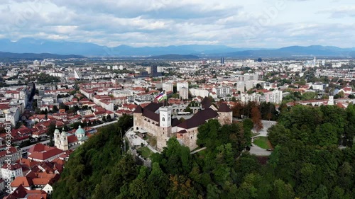 Wallpaper Mural A shot from a drone Ljubljana castle. View from a drone of a medieval fortress on a hill, Castle above the city of Ljubljana. Ljubljana drone shot. Defensive fortification in Slovenia.  Torontodigital.ca