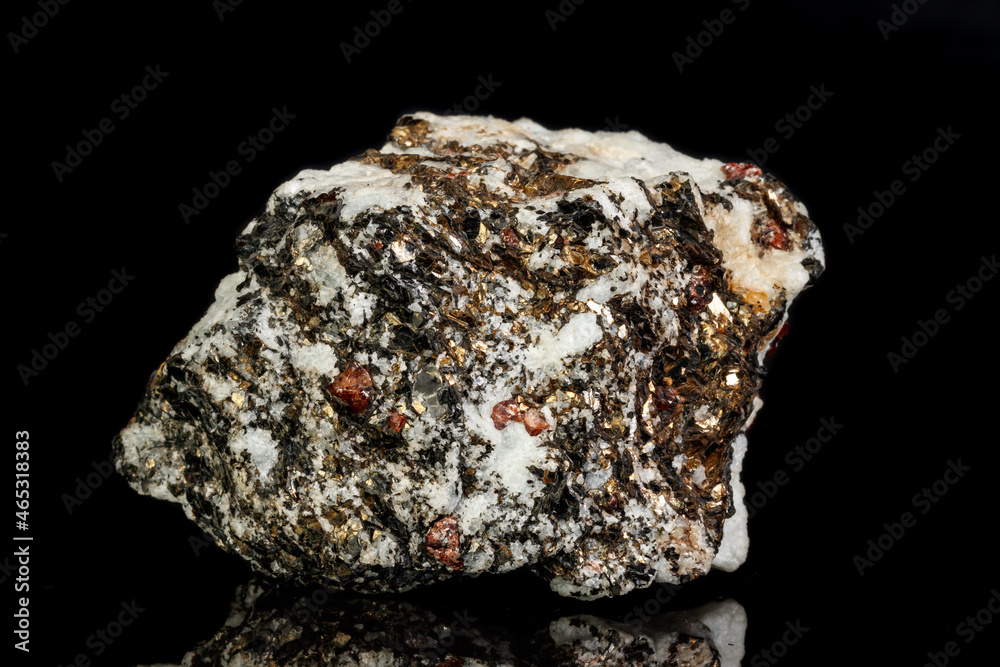 Macro Zircon mineral stone on a black background