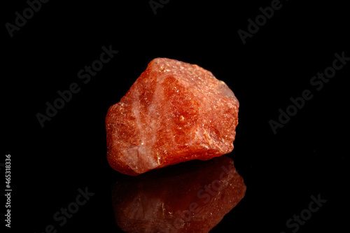 Macro mineral stone Nepheline sunny stone black background photo