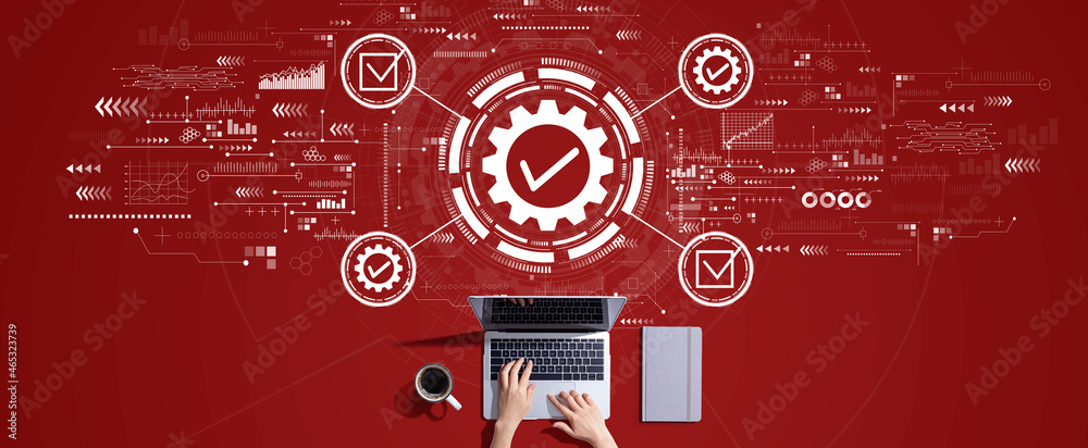 Quality control approval with person working with a laptop Quality control approval with person working with a laptop