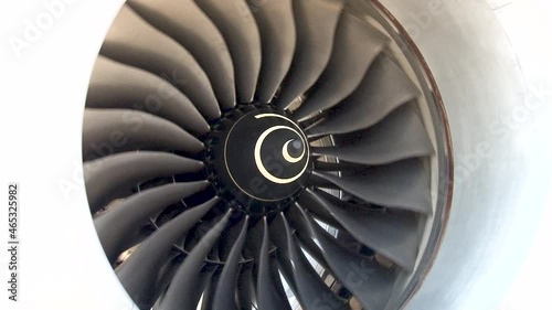 Rotor of engine rotates. Close up of curved blades of engine compressor. Nacelle with engine under wing of wide-body jet passenger aircraft. Boeing 787 Dreamliner. Zhukovsky, Russia, August 16, 2011
