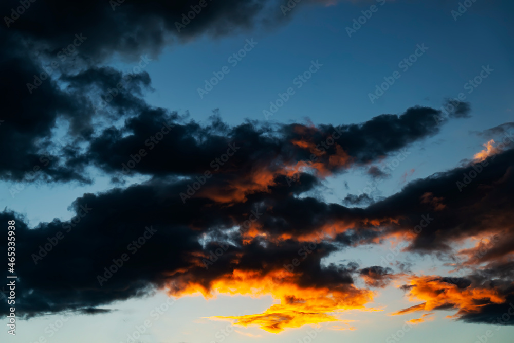 Naklejka premium Abstract of cloudscape beautiful evening sky orange clouds and blue sky