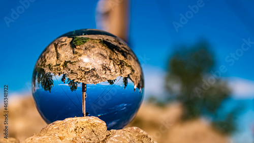 Crystal ball alpine landscape shot on a rock at the famous Kampenwand, Aschau, Chiemgau, Bavaria, Germany photo