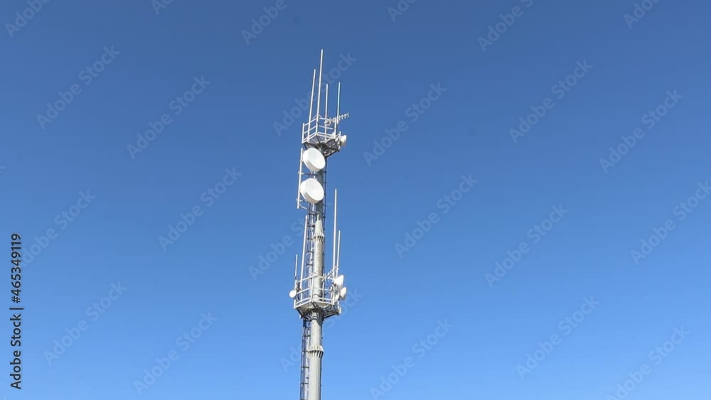 Cell Tower, 5g Mobile Communication tower on the background of blue sky. Cell Tower, 5g Mobile Communication tower on the background of blue sky.
