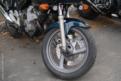Bikers  equipment and their motorcycles  motors  wheels  tanks  wings  helmets.