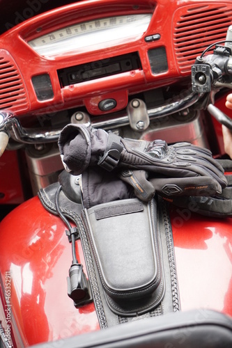Bikers' equipment and their motorcycles, motors, wheels, tanks, wings, helmets.