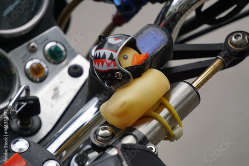 Bikers' equipment and their motorcycles, motors, wheels, tanks, wings, helmets.