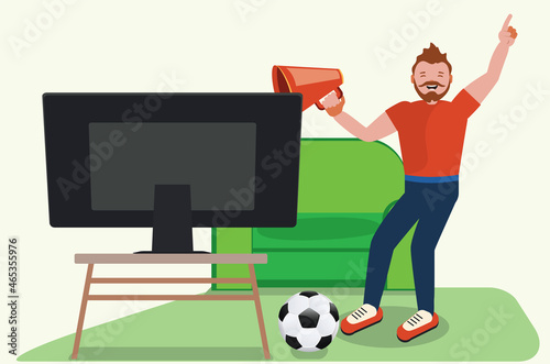 Man watch soccer on TV