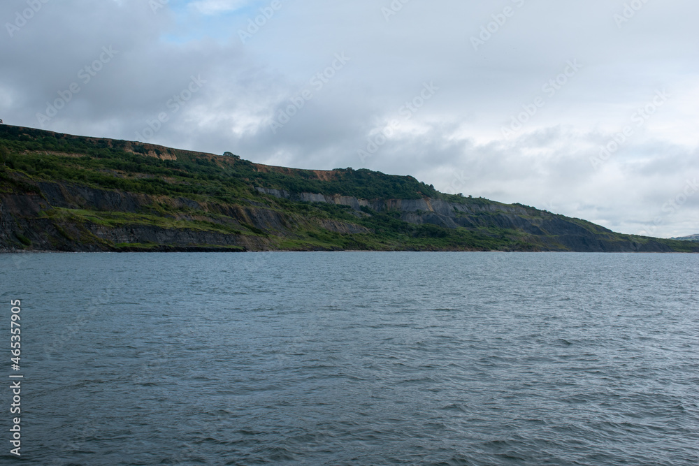 Coastal scenery on a cloudy morning at Lyme Regis, on the Jurassic Coast in Dorset, south England Coastal scenery on a cloudy morning at Lyme Regis, on the Jurassic Coast in Dorset, south England
