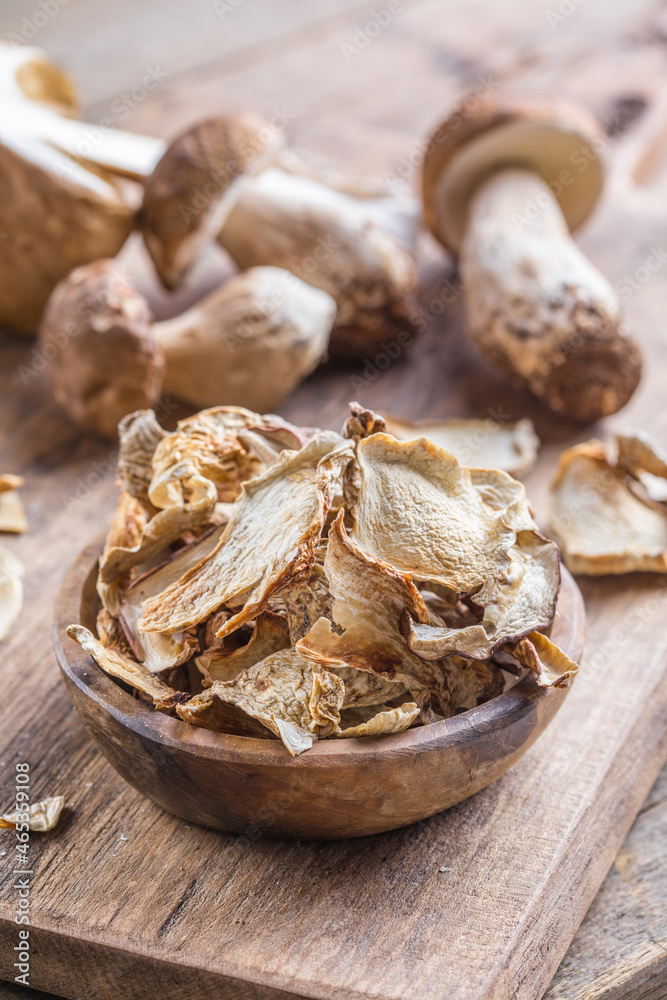 Boletus wild dried mushrooms set, on old dark wooden table background Boletus wild dried mushrooms set, on old dark wooden table background