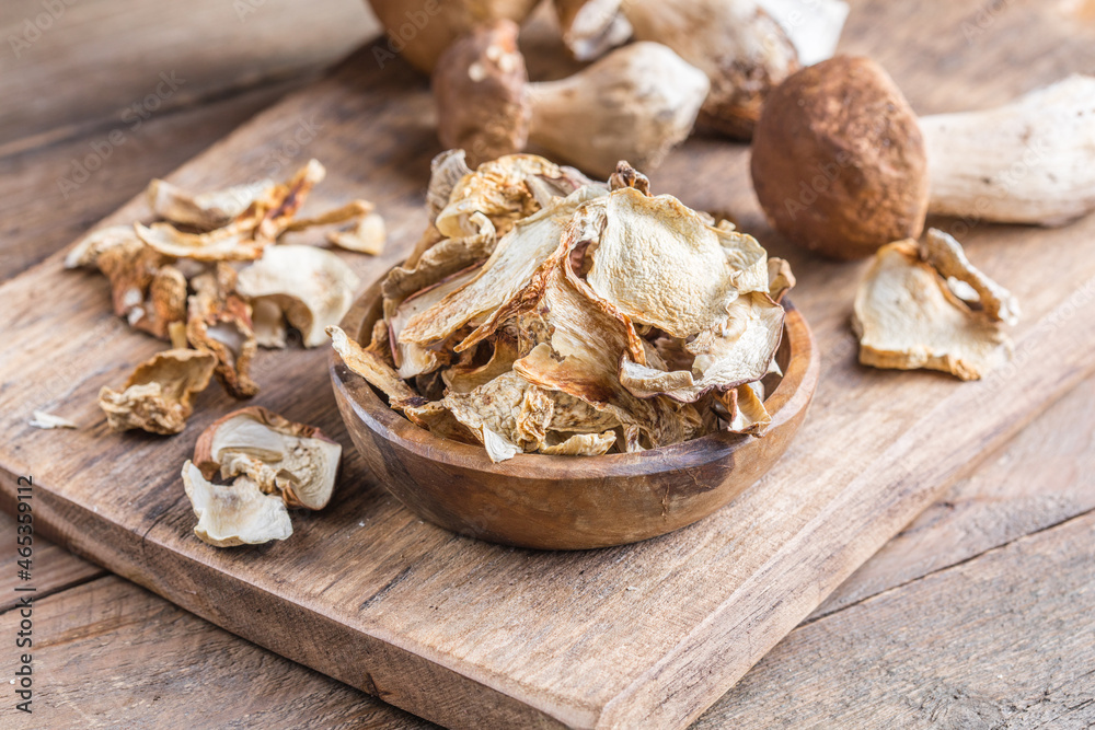 Boletus wild dried mushrooms set, on old dark wooden table background Boletus wild dried mushrooms set, on old dark wooden table background