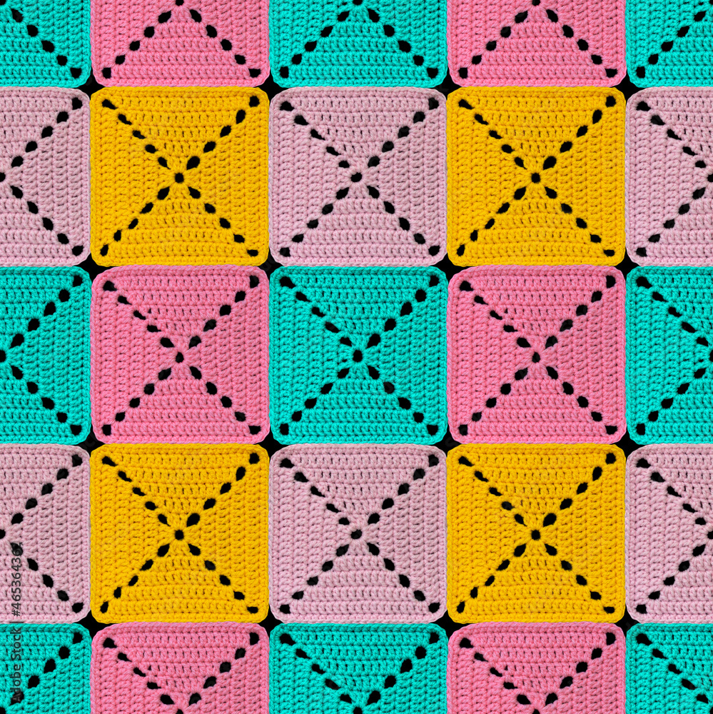 Seamless knitted pattern in patchwork style. The geometric elements are crocheted from multi-colored acrylic yarn. Bright colors.
