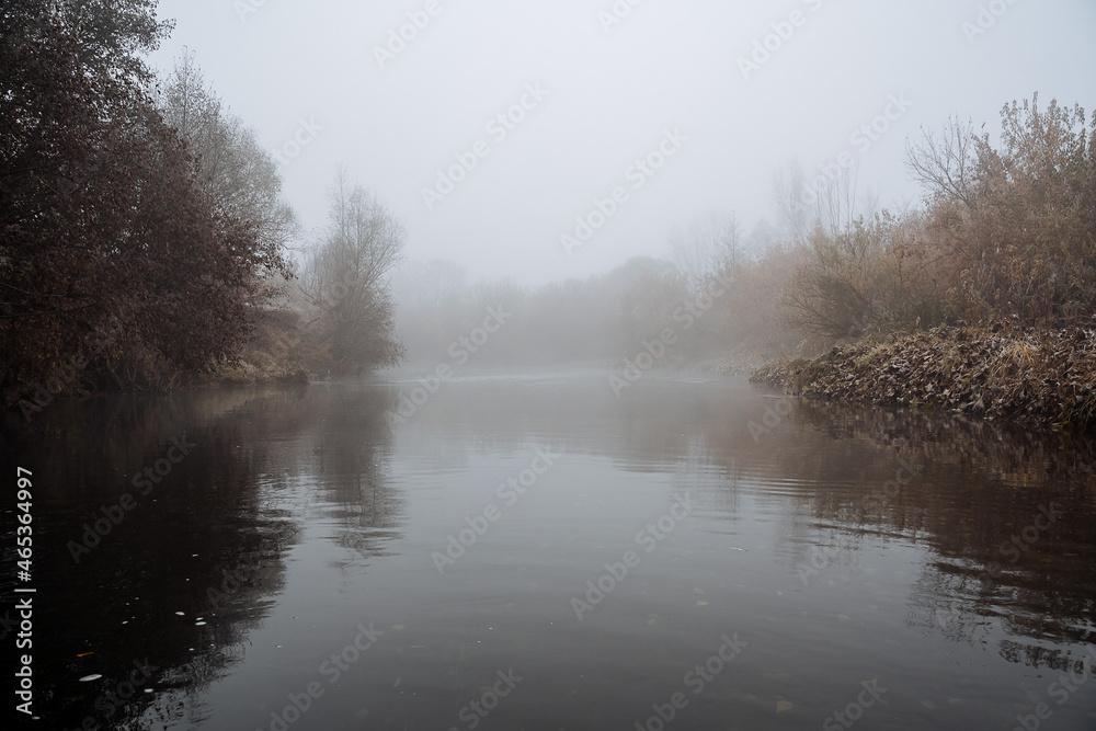 Fog on the river. Tranquility and silence on the water surface. Autumn in the Urals, Bashkortostan, Russia. Fog on the river. Tranquility and silence on the water surface. Autumn in the Urals, Bashkortostan, Russia.