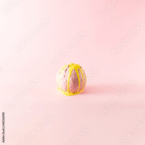 Christmas pumpkin on a light background. Soft and powdery. Pink and bright yellow. Liquid color.