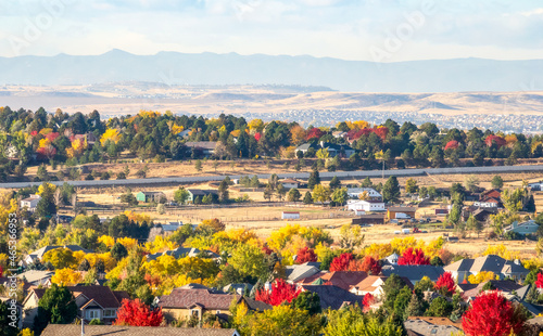 Colorado Living. Centennial, Colorado - Denver Metro Area Residential Autumn Panorama with the view of a Front Range mountains in the distance photo